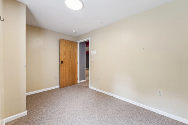 81 Edward St, Newington, CT 06111 - carpeted spare room with baseboards