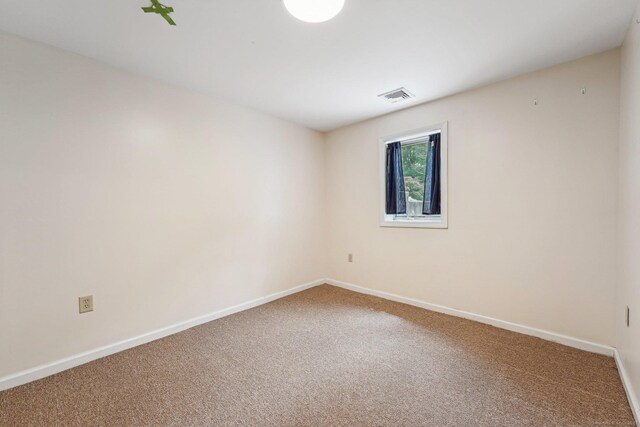81 Edward St, Newington, CT 06111 - carpeted spare room featuring baseboards