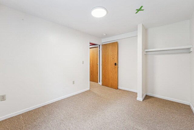 81 Edward St, Newington, CT 06111 - unfurnished bedroom featuring a closet, carpet floors, and baseboards