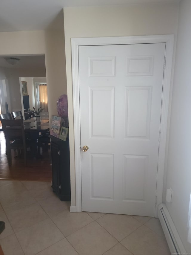 725 Merritt St, Bridgeport, CT 06606 - hallway featuring light tile patterned floors and baseboard heating