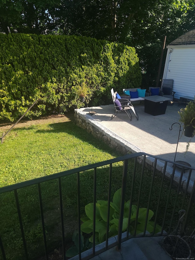 725 Merritt St, Bridgeport, CT 06606 - view of green lawn with a patio area and an outdoor living space