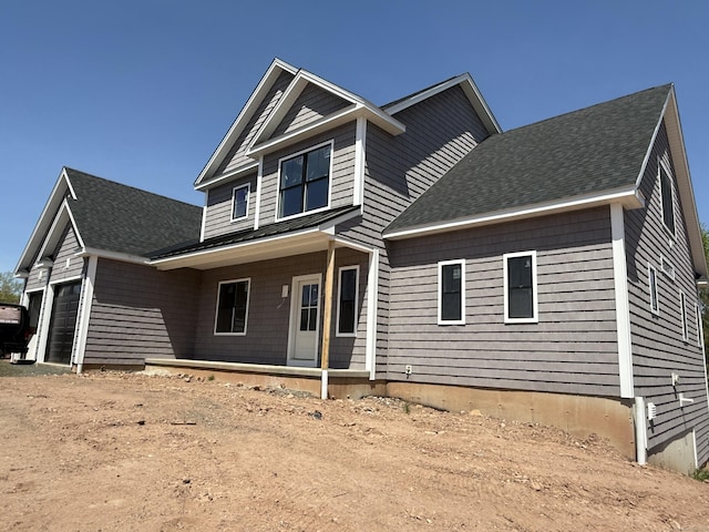 23 Melrose Dr, Cheshire, CT 06410 - view of front of property with an attached garage, roof with shingles, and a porch