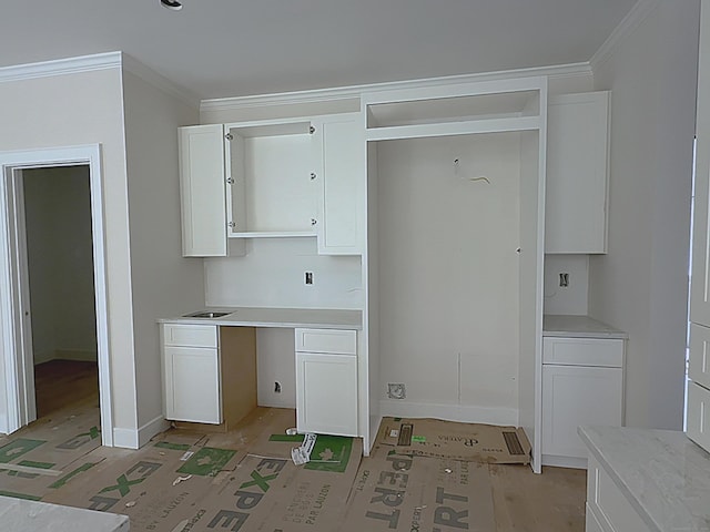 23 Melrose Dr, Cheshire, CT 06410 - kitchen with white cabinets, open shelves, crown molding, and light countertops