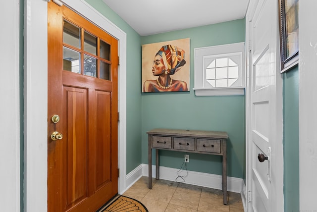 39 Woodcrest Ave, Stratford, CT 06614 - foyer with light tile patterned floors and baseboards