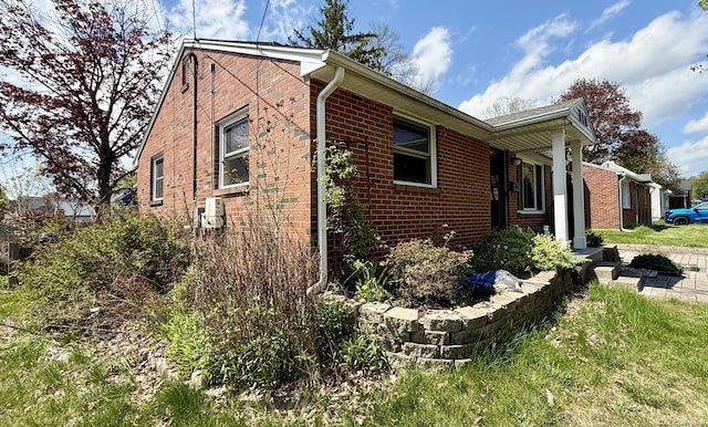 108 Dartmouth St, Torrington, CT 06790 - view of side of home featuring brick siding
