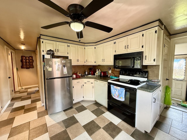 108 Dartmouth St, Torrington, CT 06790 - kitchen with black appliances, dark countertops, decorative backsplash, ceiling fan, and white cabinets