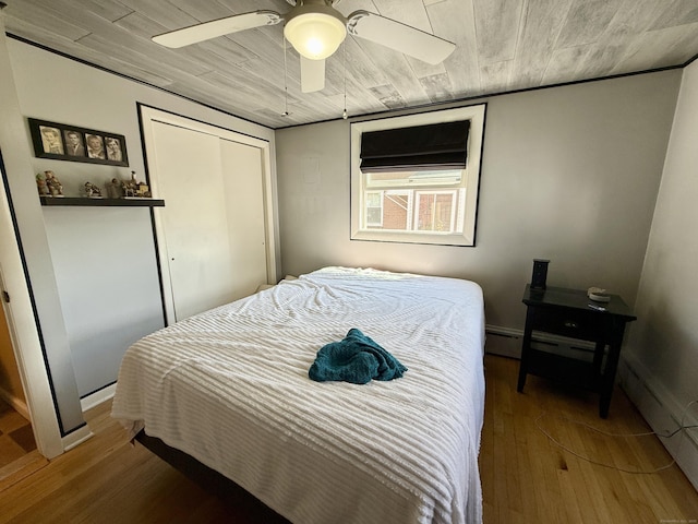 108 Dartmouth St, Torrington, CT 06790 - bedroom featuring wood finished floors, a closet, ceiling fan, a baseboard radiator, and wooden ceiling