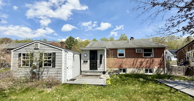 108 Dartmouth St, Torrington, CT 06790 - rear view of property featuring brick siding and a chimney