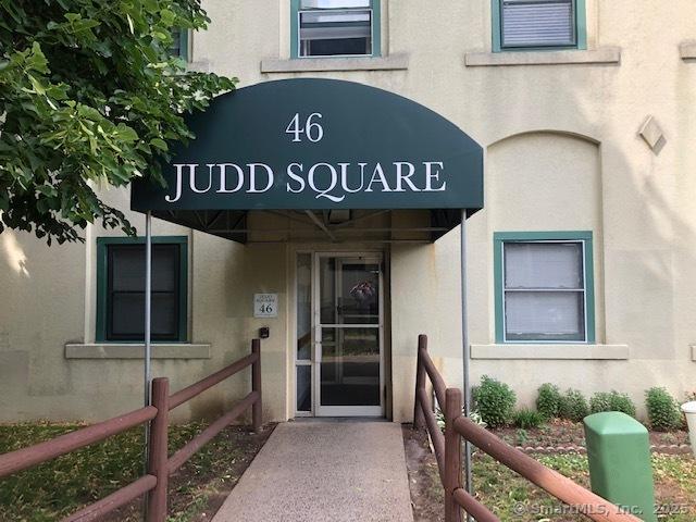 452 Judd Sq Unit 452, Wallingford, CT 06492 - doorway to property featuring stucco siding
