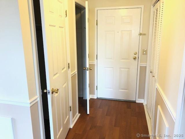452 Judd Sq Unit 452, Wallingford, CT 06492 - corridor featuring dark wood-style flooring