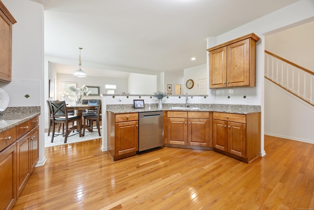 1 Chatham Ct Unit 1, Middlebury, CT 06762 - kitchen with dishwasher, a sink, brown cabinetry, light wood-type flooring, and recessed lighting