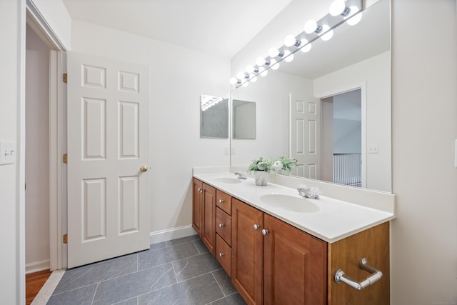 1 Chatham Ct Unit 1, Middlebury, CT 06762 - bathroom with double vanity and baseboards