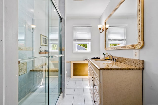 54 Swampscott Rd, Stamford, CT 06905 - full bathroom featuring vanity, a shower stall, and tile patterned flooring