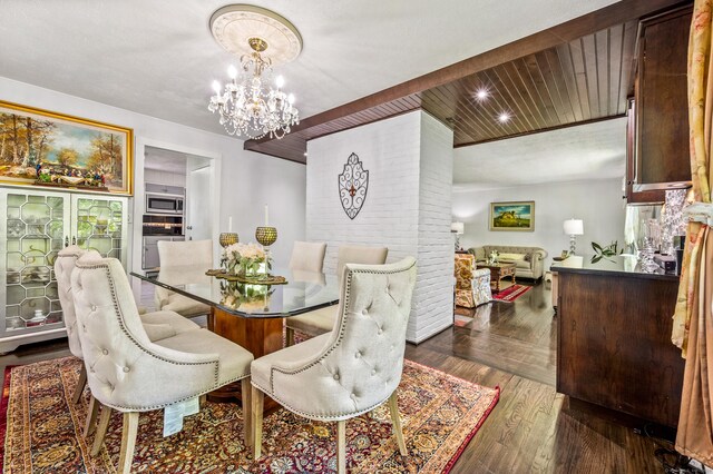 54 Swampscott Rd, Stamford, CT 06905 - dining room featuring a chandelier and dark wood finished floors