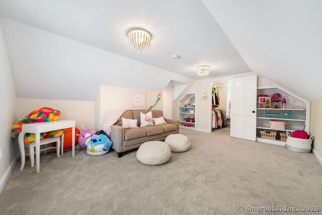 879 Russell Ave, Suffield, CT 06078 - game room featuring carpet and lofted ceiling