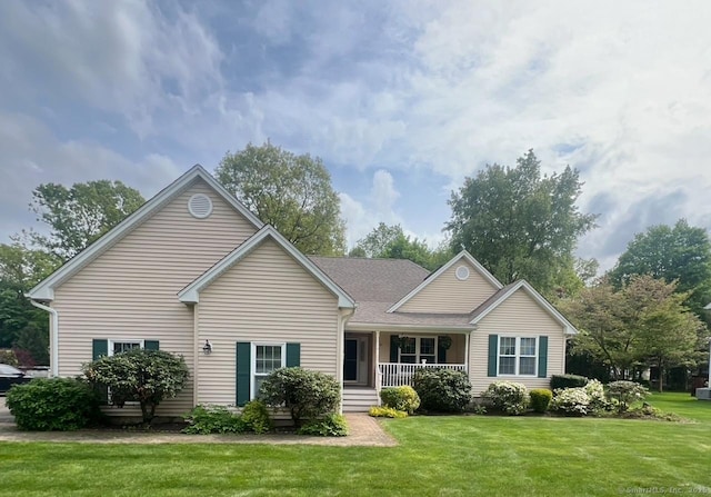 45 Kuhr Dr, Southington, CT 06489 - view of front of property with covered porch and a front yard