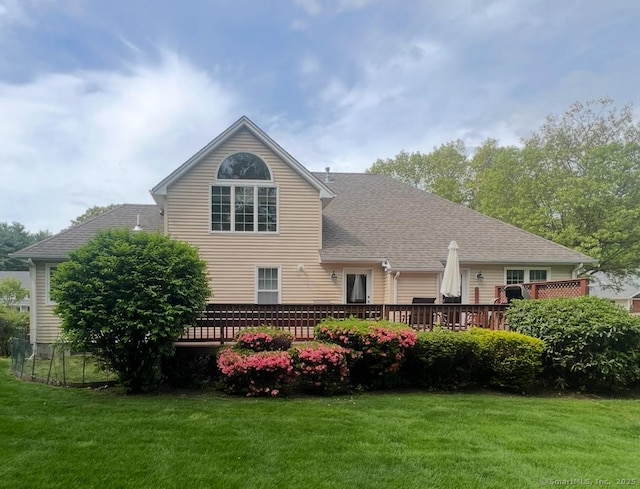 45 Kuhr Dr, Southington, CT 06489 - rear view of house featuring a deck, a yard, and roof with shingles