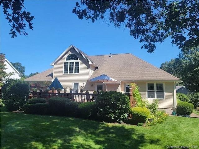 45 Kuhr Dr, Southington, CT 06489 - back of property with a lawn and a shingled roof