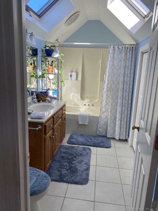 45 Kuhr Dr, Southington, CT 06489 - bathroom with a skylight, tile patterned floors, lofted ceiling, shower / bathtub combination with curtain, and vanity