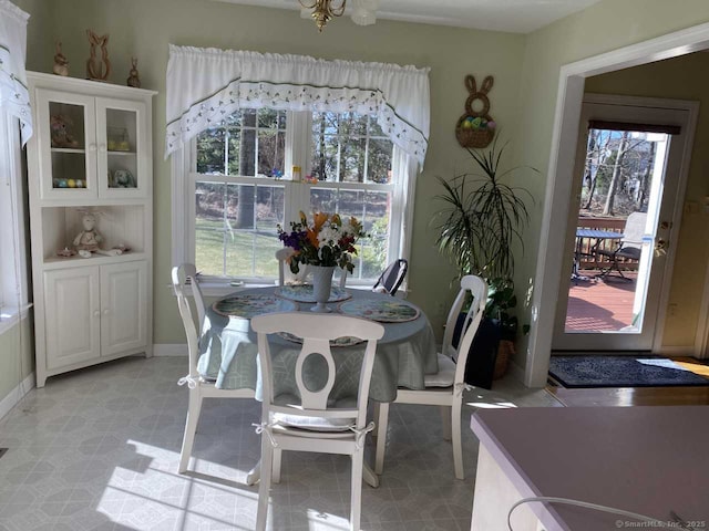 45 Kuhr Dr, Southington, CT 06489 - dining room featuring light floors and a chandelier