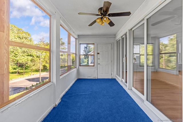 593 Cooke St, Waterbury, CT 06710 - unfurnished sunroom featuring a ceiling fan