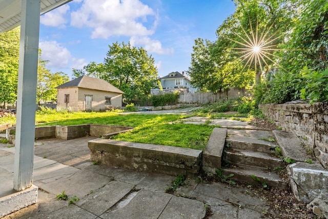 593 Cooke St, Waterbury, CT 06710 - view of yard with a patio and an outdoor structure