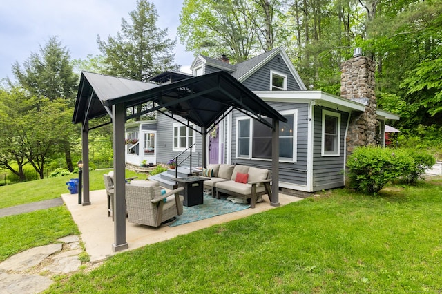27 Pleasant Valley Rd, Barkhamsted, CT 06063 - back of property with a chimney, an outdoor living space, a lawn, and a patio