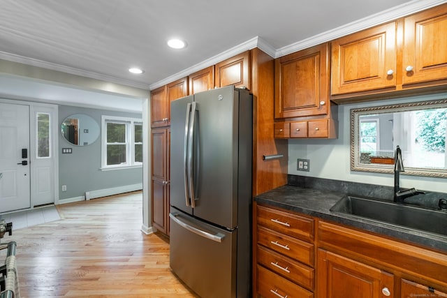 27 Pleasant Valley Rd, Barkhamsted, CT 06063 - kitchen featuring freestanding refrigerator, a sink, baseboard heating, brown cabinets, and recessed lighting