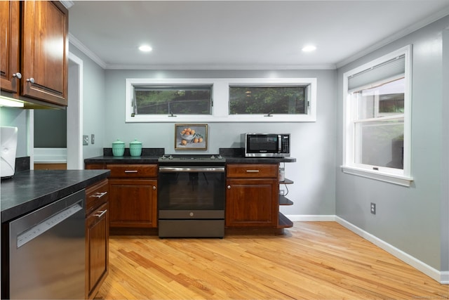 27 Pleasant Valley Rd, Barkhamsted, CT 06063 - kitchen featuring stainless steel appliances, ornamental molding, dark countertops, light wood-type flooring, and baseboards