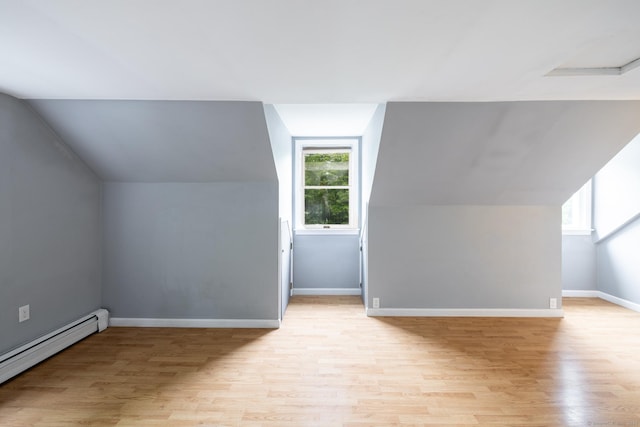 27 Pleasant Valley Rd, Barkhamsted, CT 06063 - bonus room featuring a baseboard heating unit, light wood finished floors, plenty of natural light, vaulted ceiling, and baseboards