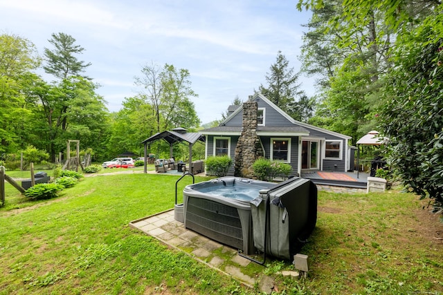 27 Pleasant Valley Rd, Barkhamsted, CT 06063 - view of green lawn featuring a hot tub, a gazebo, and a wooden deck