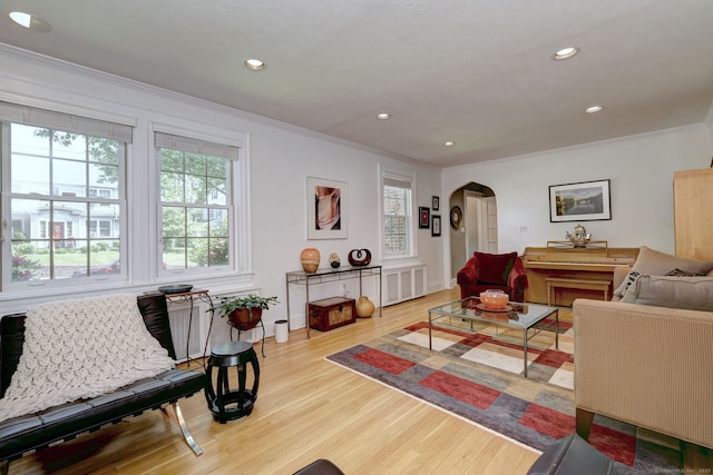 166 Roydon Rd, New Haven, CT 06511 - living area featuring arched walkways, ornamental molding, plenty of natural light, wood finished floors, and recessed lighting