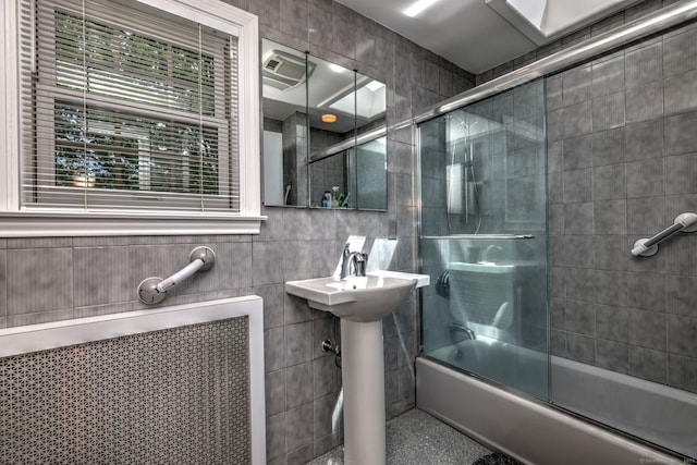 166 Roydon Rd, New Haven, CT 06511 - full bathroom with enclosed tub / shower combo, tile walls, and radiator