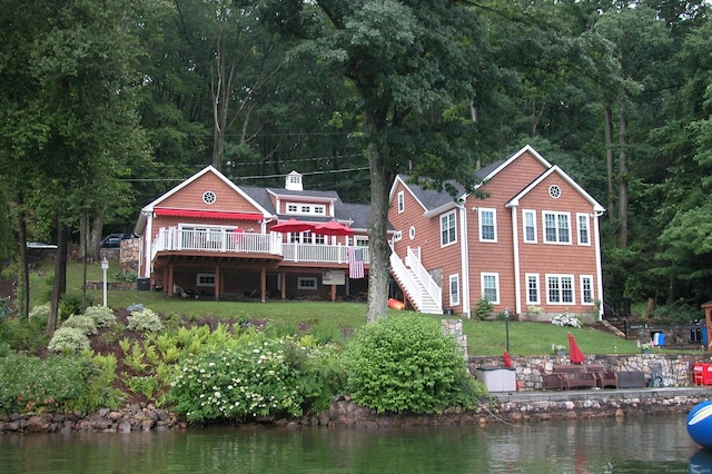 1 Shady Knls, Danbury, CT 06811 - back of property with stairway, a deck with water view, a lawn, a chimney, and a forest view