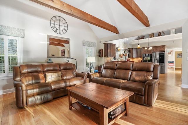 1 Shady Knls, Danbury, CT 06811 - living room featuring beam ceiling, high vaulted ceiling, light wood-style flooring, and baseboards