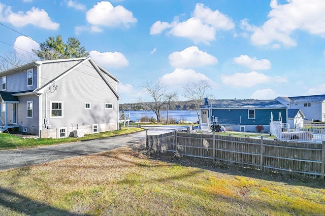 75 W Shore Rd, Ellington, CT 06029 - rear view of property featuring a water view and asphalt driveway