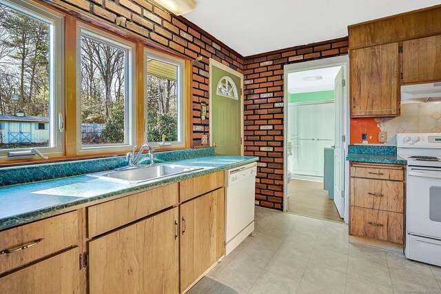 75 W Shore Rd, Ellington, CT 06029 - kitchen featuring white appliances, a sink, under cabinet range hood, decorative backsplash, and light tile patterned flooring
