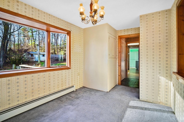 75 W Shore Rd, Ellington, CT 06029 - carpeted spare room featuring baseboard heating, wallpapered walls, and a chandelier