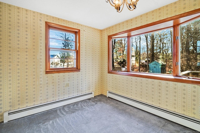 75 W Shore Rd, Ellington, CT 06029 - carpeted empty room with a baseboard heating unit, a chandelier, and wallpapered walls