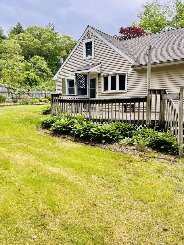75 W Shore Rd, Ellington, CT 06029 - back of house with a deck, a yard, and a shingled roof