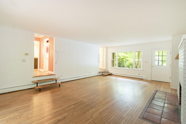 82 Whitethorn Dr, Guilford, CT 06437 - unfurnished living room featuring a fireplace and wood-type flooring