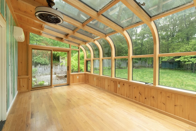 82 Whitethorn Dr, Guilford, CT 06437 - unfurnished sunroom featuring hardwood / wood-style flooring, wooden walls, and an AC wall unit