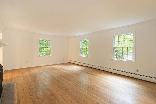 82 Whitethorn Dr, Guilford, CT 06437 - unfurnished living room with a baseboard radiator, plenty of natural light, light wood-type flooring, ornamental molding, and a brick fireplace