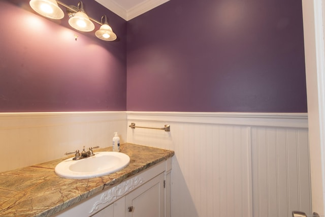 82 Whitethorn Dr, Guilford, CT 06437 - bathroom with a wainscoted wall, ornamental molding, and vanity