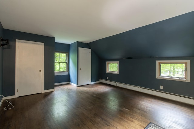 82 Whitethorn Dr, Guilford, CT 06437 - additional living space featuring healthy amount of natural light, wood finished floors, a baseboard radiator, vaulted ceiling, and baseboards