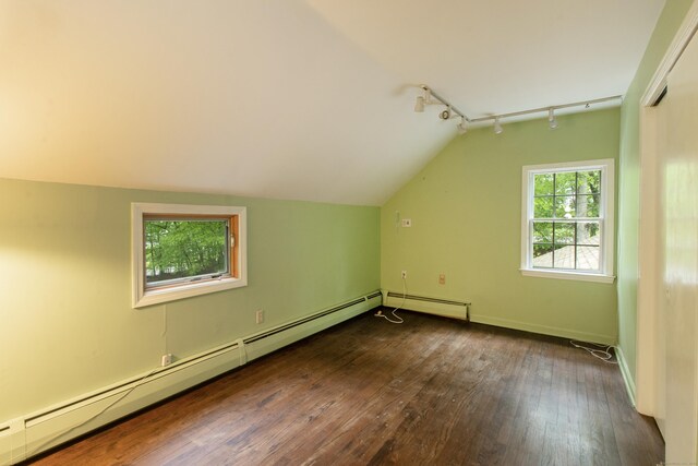 82 Whitethorn Dr, Guilford, CT 06437 - bonus room with a baseboard radiator, dark wood-style floors, lofted ceiling, and baseboards