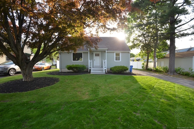 14 Harvest Ln, Bristol, CT 06010 - view of front facade with a shingled roof