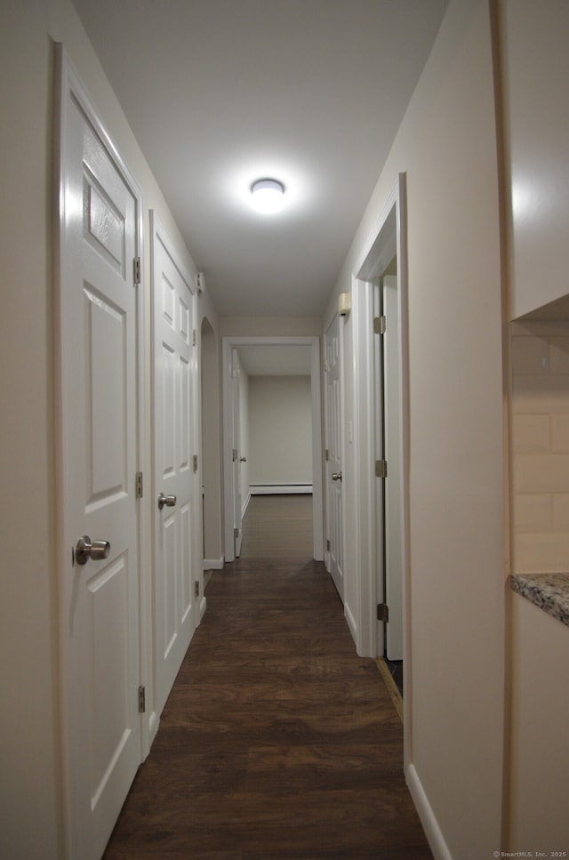 14 Harvest Ln, Bristol, CT 06010 - hallway with dark wood-style floors and baseboards