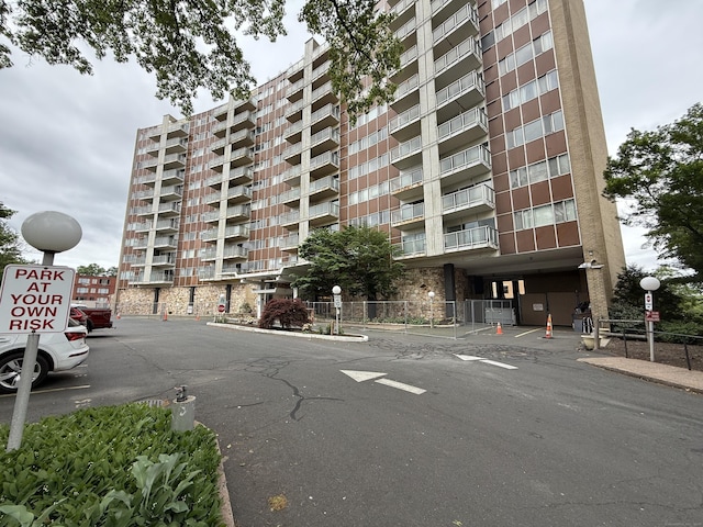 30 Woodland St Apt 5F, Hartford, CT 06105 - view of apartment building / complex with uncovered parking