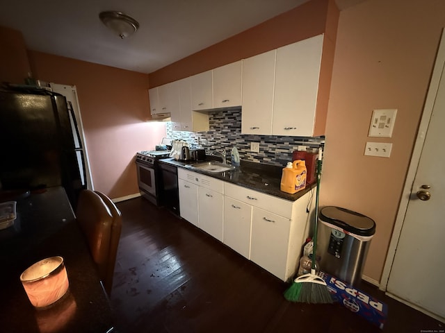 30 Woodland St Apt 5F, Hartford, CT 06105 - kitchen featuring range with gas cooktop, a sink, dark countertops, dark wood-style floors, and decorative backsplash